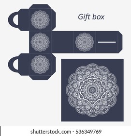 Openwork gift paper box with a handle.Greeting packaging with lace pattern. Presents packing, Pattern suitable for laser cutting, plotter cutting or printing. Vector