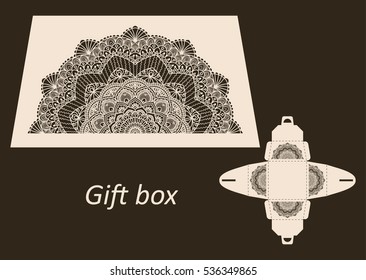Openwork gift paper box with a handle.Greeting packaging with lace pattern. Presents packing, Pattern suitable for laser cutting, plotter cutting or printing. Vector.