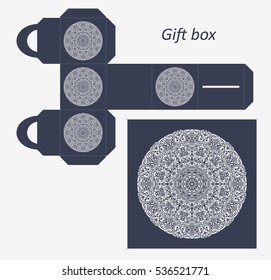 Openwork gift paper box with a handle.Greeting packaging with lace pattern. Template presents packing. Pattern suitable for laser cutting, plotter cutting or printing. Vector.