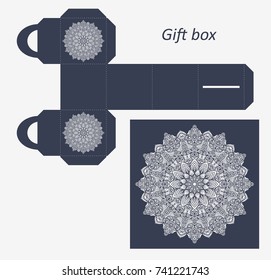 Openwork gift paper box with a handle.Greeting packaging with lace pattern. Template presents packing, Pattern suitable for laser cutting, plotter cutting or printing. Vector.