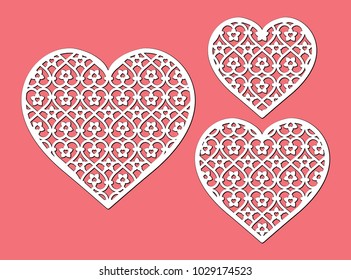 Openwork heart with a lace ornament. Laser cutting template. Valentine's Day sign, love symbol. Vector silhouette of element. Illustration isolated on red background.