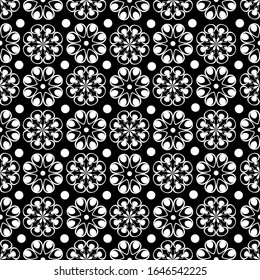 Openwork white ornament with geometric flowers and circles on a black background. Suitable for fabrics, wallpapers, wrapping paper, covers, covers for smartphones and tablets, tiles, napkins, dishes.