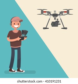 The operator controls the quadrocopter with a professional camera. Shooting close-ups from the air.