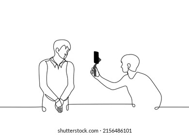 operator shoots shy man on phone with a stabilizer - one line drawing vector. concept of shooting content for video blogger, interviewing, shooting vertical video