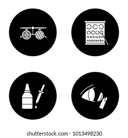 Ophtalmology glyph icons set. Exam glasses, Landolt chart, eye drops and dropper, contact lens. Vector white silhouettes illustrations in black circles