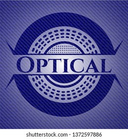 Optical emblem with jean texture