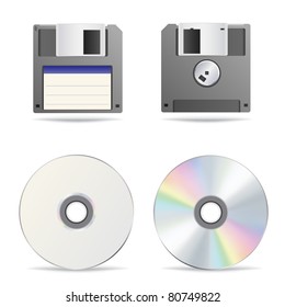 The optical and floppy disc isolated on the white background