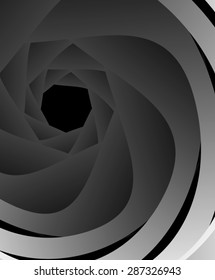 Optical illusion. Spiraling circle with gray and white blades.