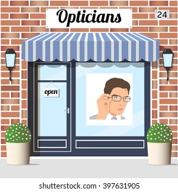 Opticians shop (store). Building with red brick facade. Poster of a young man in glasses in window. EPS 10 vector. 