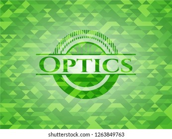 Optics green emblem with triangle mosaic background
