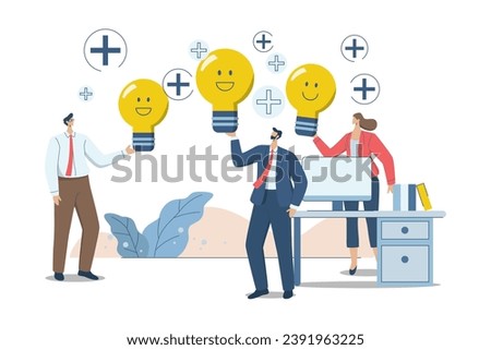 Optimism attitude or positive thinking, Emotional intelligence inspires happy co-workers and life, Happy business men and coworkers holding light bulb concepts smiling in a positive atmosphere.