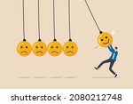 Optimistic, happiness or positive thinking inspire other people happy, emotional intelligence or balance between happiness and sadness, man holding smile face pendulum ball to hit other sad faces.
