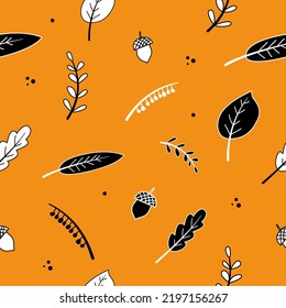 Orange autumn seamless pattern. Repeated pattern with black and white fall season elements. Leaves, acorns, twigs.