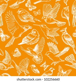 Orange birds and butterflies seamless pattern