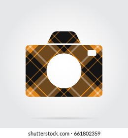 orange, black isolated tartan icon with white stripes - camera and shadow in front of a gray background