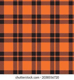 Orange and black simple Halloween plaid. Seamless vector tartan suitable for fashion, home decor and stationary.