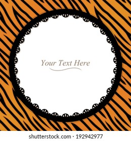 An orange and black tiger striped frame with a black lace trim. Eps 10 Vector.