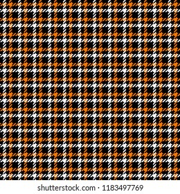 Orange, Black and White Houndstooth Tartan Seamless Vector Pattern Tile. Halloween Background. High Fashion Textile Print. Dog tooth Check Fabric Texture. Pattern Tile Swatch Included.