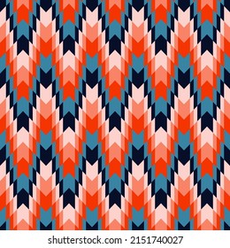 Orange and blue aztec design seamless pattern.