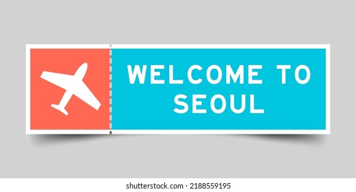 Orange and blue color ticket with plane icon and word welcome to seoul on gray background