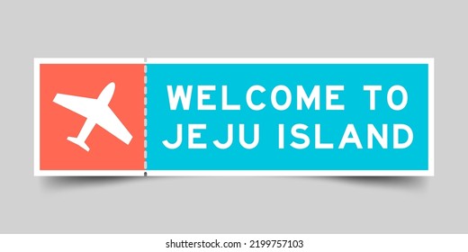 Orangefarbene und blaue Farbkarte mit Flugzeugsymbol und Wort willkommen auf Jeju Insel auf grauem Hintergrund