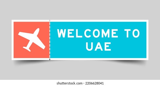 Orange and blue color ticket with plane icon and word welcome to UAE (united arab emirates) on gray background