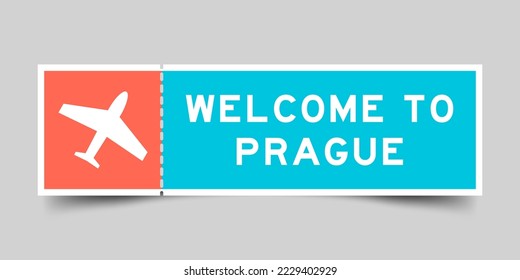 Orange and blue color ticket with plane icon and word welcome to prague on gray background