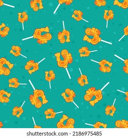 Orange and blue colours seamless background with candy pattern. Sweets cartoon wallpaper for different wrapping paper prints. Textile texture for children party