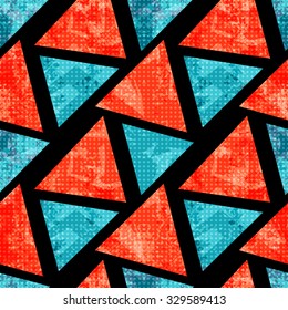 orange and blue polygons on a black background. Geometric seamless pattern. grunge effect. vector illustration.