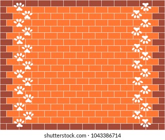 Orange brick wall graphic design with animal paw prints