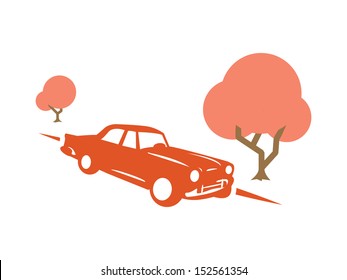 Orange and Brown Color Schemed 50's Vehicle driving down Main Street with two trees curbside.