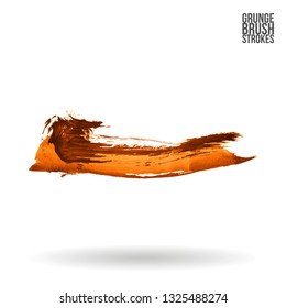 Orange brush stroke and texture. Grunge vector abstract hand - painted element. Underline and border design.