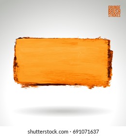 Orange brush stroke and texture. Grunge vector abstract hand - painted element. Underline and border design.