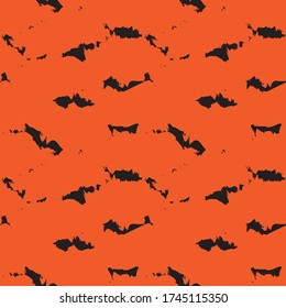 Orange Camouflage abstract seamless pattern background suitable for fashion textiles, graphics