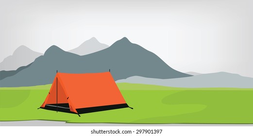 Orange camping tent in mountain background. Mountain landscape. Travel and adventure camp tent