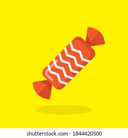 orange candy with yellow background
