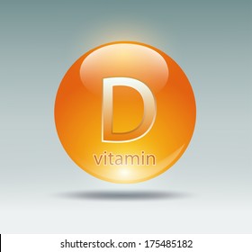 orange capsule with vitamin D on a blue background