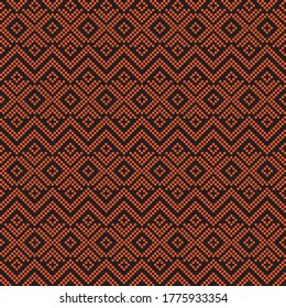 Orange Christmas fair isle pattern background for fashion textiles, knitwear and graphics