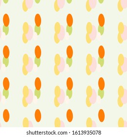 Orange circles of yellow, orange green, and white are evenly spaced