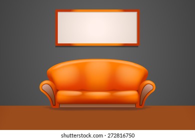 orange couch stand at wall with frame