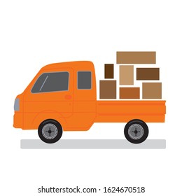 orange delivery car with boxes on the trunk