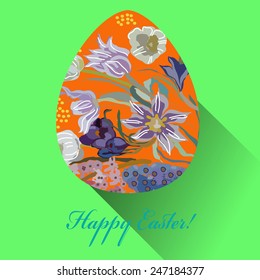 Orange Easter egg with floral ornaments, text   on a green  background. Hand drawn. 