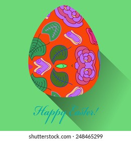 Orange Easter egg with floral ornaments, text  on a pale green  background. Hand drawn. 
