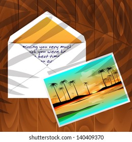 Orange Envelope with message and photograph of a sunset