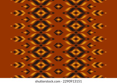 Orange fabric ethnic pattern art. Ethnic ikat seamless pattern traditional. American, Mexican style. Design for background, wallpaper, fabric, clothing, carpet, textile, batik, embroidery.