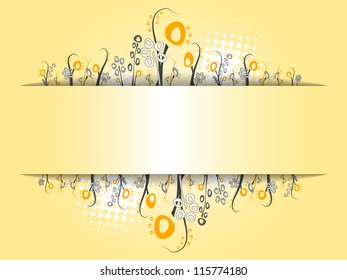 Orange floral border Artificial flowers creating a border behind a narrow sheet on the orange background