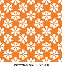 Orange floral ornament with white elements. Seamless pattern for textile and wallpapers
