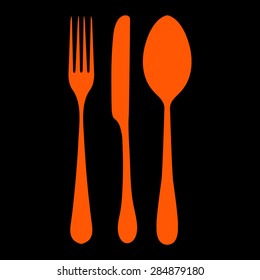 Orange fork spoon knife on a black background