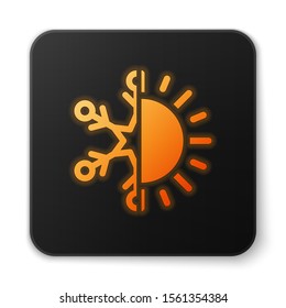 Orange glowing neon Hot and cold symbol. Sun and snowflake icon isolated on white background. Winter and summer symbol. Black square button. Vector Illustration