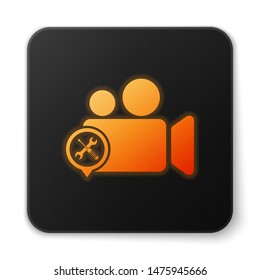 Orange glowing Video camera with screwdriver and wrench icon isolated on white background. Adjusting, service, setting, maintenance, repair, fixing. Black square button. Vector Illustration